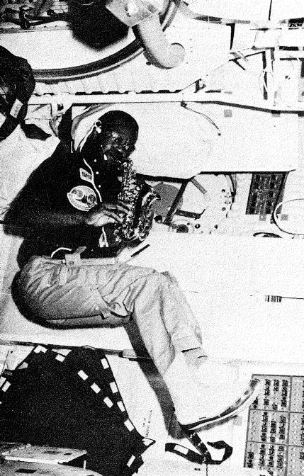 Astronaut Ronald McNair plays saxophone on the space shuttle